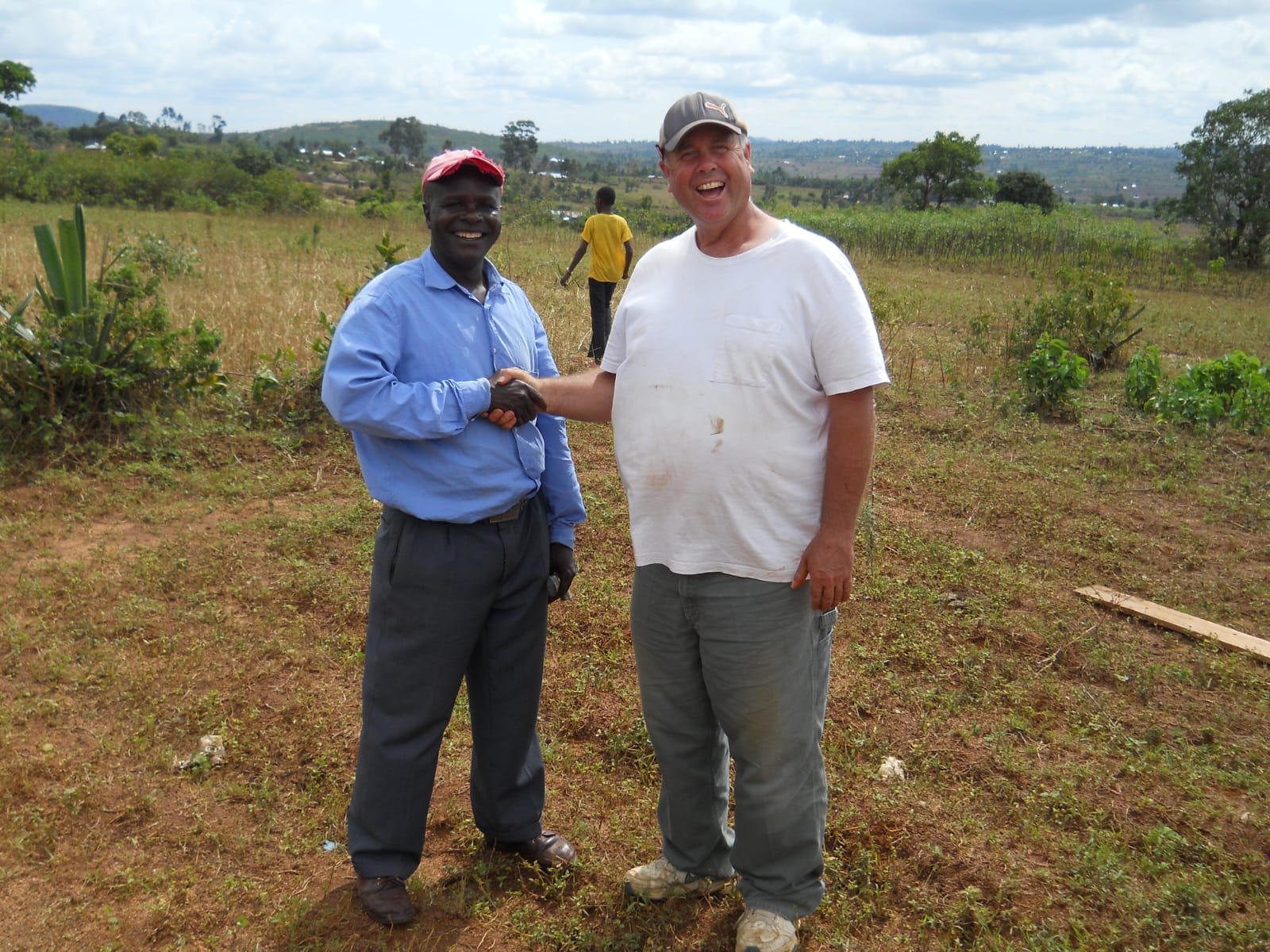 Jay MacDonald and Kennedy during the construction of Kengariso Church in 2014